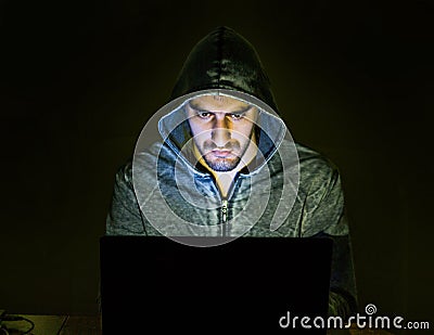 Hacker trying to scam people online Stock Photo