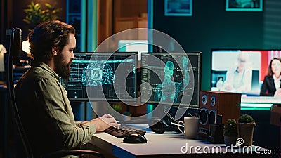 Hacker uploading evolved sentient AI to disk, planning to use it for evil plan Stock Photo