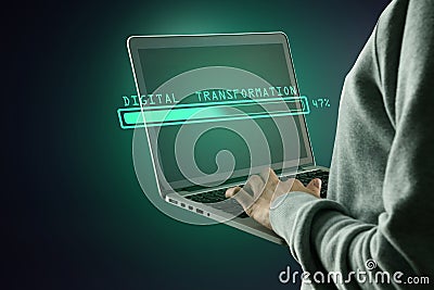 Hacker using laptop computer with abstract glowing loading bar on gray dark background. Digital transformation, hacking, internet Stock Photo