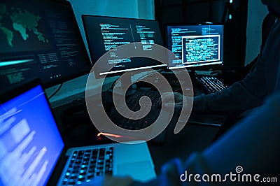 Hacker working on computer cyber crime Stock Photo