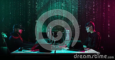 Hackers are breaking server using computers. Cybercrime concept. Stock Photo