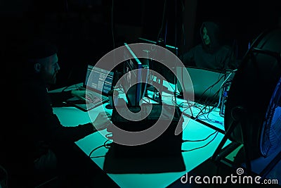 Hackers breaking server using multiple computers and infected virus ransomware. Cybercrime, technology, phishing mail Stock Photo