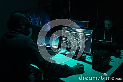 Hackers breaking server using multiple computers and infected virus ransomware. Cybercrime, technology, phishing mail Stock Photo