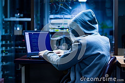 Hackers trying to hide in the dark Stock Photo