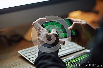Hacking, phone screen and man hands for software data, crack code or password and internet or cybersecurity crime Stock Photo