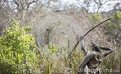 Hadzabe hunter in a african bush Editorial Stock Photo