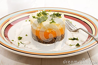 Haggis with mashed potato and turnips on a plate Stock Photo