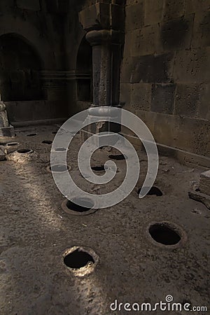 The Haghpat monastery in Armenia. Openings in the floor in place Stock Photo