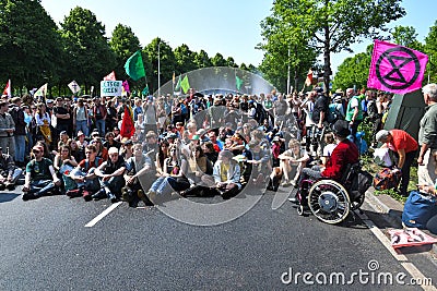 Thousands of Extinction rebellion activists protesting by blocking the A12 motorway. Editorial Stock Photo