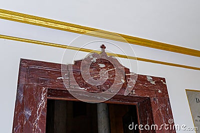 The marble carved decoration over the entrance to the wall in the hallway of the Stella Maris Monastery which is located on Mount Editorial Stock Photo