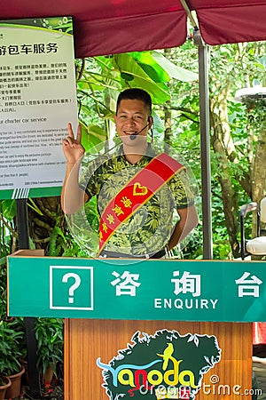 Hainan, China - May 17, 2019: Service staff, ranger. Rainforest Cultural Tourism Zone Hainan island, Forest Park Yanoda Editorial Stock Photo