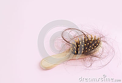 Hair brush with loss hair hairloss problem concept Stock Photo