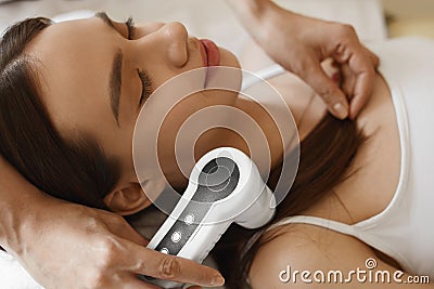 Hair Care. Woman Analyzing Hair With Analysis System. Beauty Stock Photo