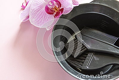Hairdressing tools with copy space on pink background. Top view. Stock Photo