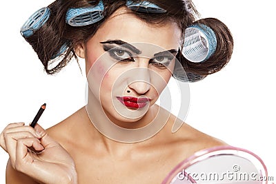 Hair curlers and bad make up Stock Photo