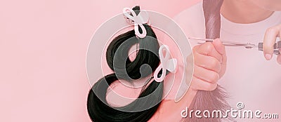 Hair donation for breast cancer person concept. Donate hair to wigs for breast cancer patients. Donate to cancer charity. Asian Stock Photo