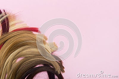 Hair extension equipment of natural hair. Hair samples of different colors Stock Photo