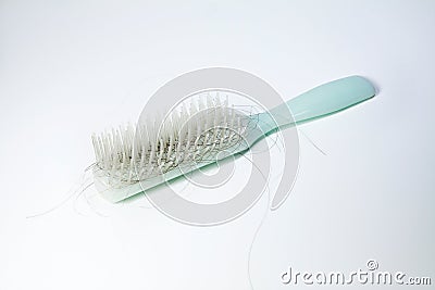 Hair loss problem. Hairs fall in comb, hair fall everyday Stock Photo