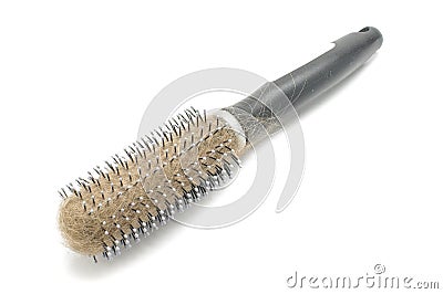 Hairbrush with lost hairs with clipping path Stock Photo