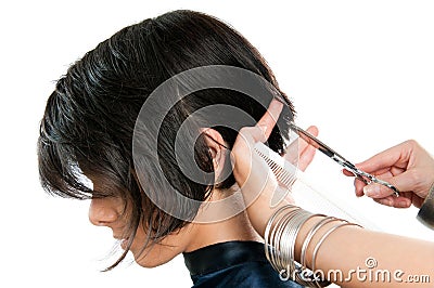 Hairdresser cutting hair Stock Photo