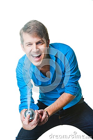Hairdresser man with hairspray on isolated white Stock Photo
