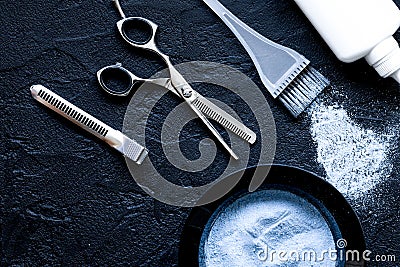 Hairdresser profession select of hair color on dark background Stock Photo