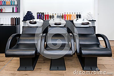 Hairdresser`s workplace. Modern beauty salon interior. Hair salon interior business. Work places for masters. Stock Photo