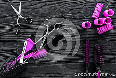 Hairdresser set on grey wooden background top view copyspace Stock Photo