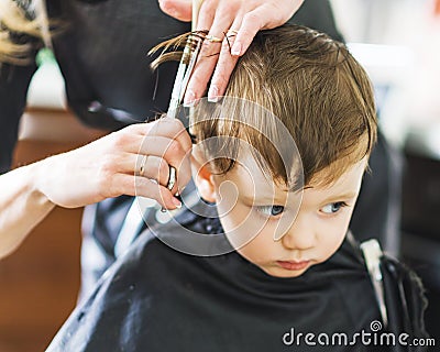 Hairdresser shears boy scissors Stock Photo