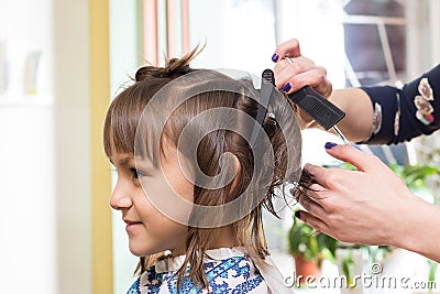 Hairdresser shears girl Stock Photo