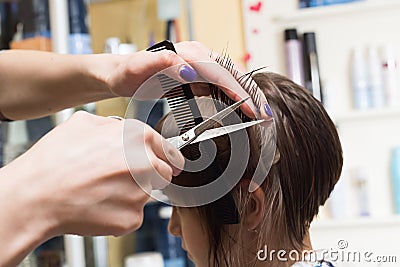 Hairdresser shears girl Stock Photo