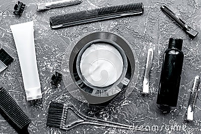 Hairdresser woorking desk with tools on gray background top view Stock Photo