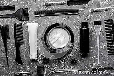 Hairdresser woorking desk with tools on gray background top view Stock Photo