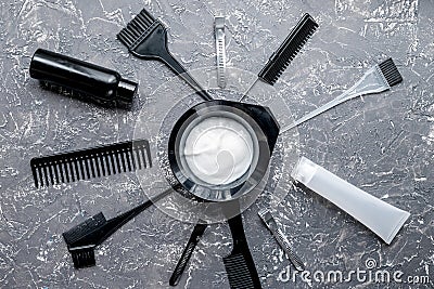 Hairdresser woorking desk with tools on gray background top view Stock Photo