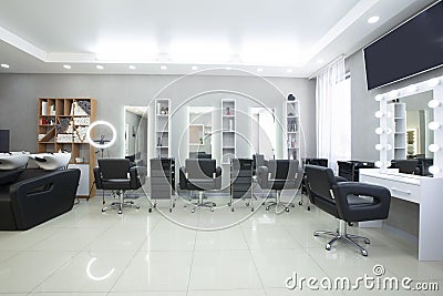 Hairdressing procedures in luxe beauty salon, panorama Stock Photo