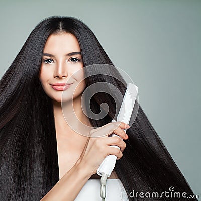 Hairdressing. Woman with Beautiful Long Straight Hair Stock Photo