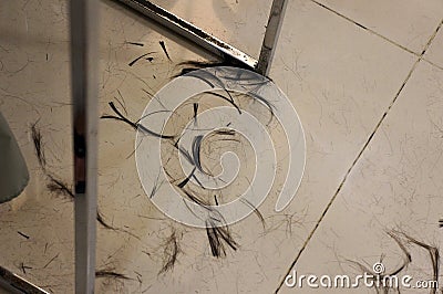 Hairline on the ground in hair salon Stock Photo