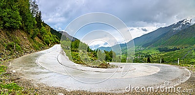 Hairpin turn on the road from Mestia to Ushguli in Georgia Stock Photo