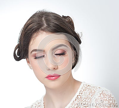 Hairstyle and make up - beautiful young girl art portrait with closed eyes. Genuine natural brunette, studio shot Stock Photo