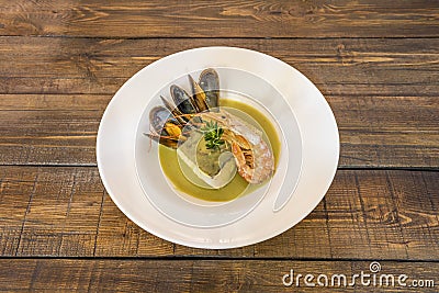 Hake in green sauce is a Basque cuisine dish whose main ingredient Stock Photo