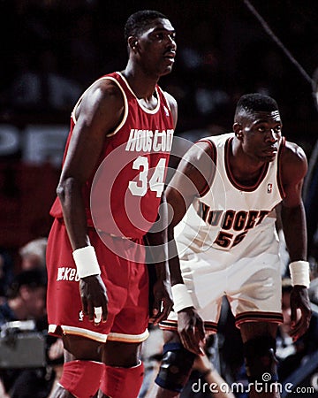 Hakeem Olajuwon and Dikembe Mutumbo. Editorial Stock Photo