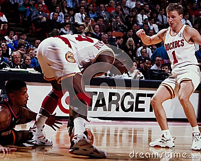 Hakeem Olajuwon and Scott Brooks. Editorial Stock Photo