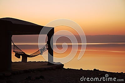 Ð¡halet at sunset, Dead sea. Stock Photo
