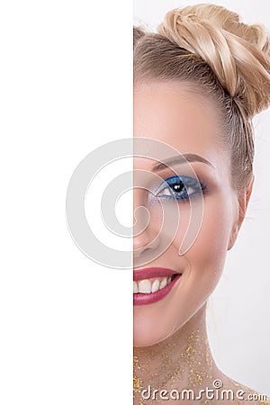 Half beauty face with blank board concept, Close up half face portrait of girl with perfect fresh clean skin, young model with Stock Photo