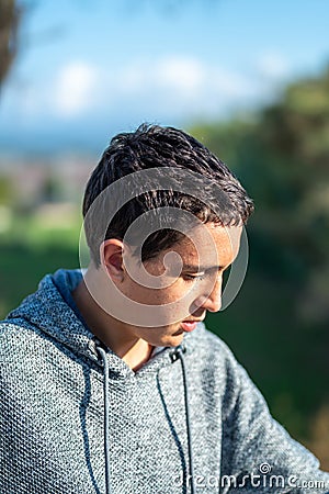 Half body photo of latin teenage boy with black hair Stock Photo