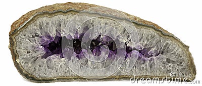 Half-cut amethyst stone isolated on white background Stock Photo