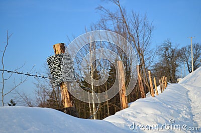 Half done barbed wire fence Stock Photo