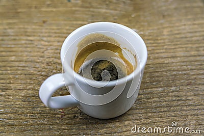 Half drunk cup of strong espresso coffee Stock Photo