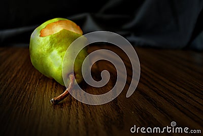 Half eaten bartlett pear Stock Photo