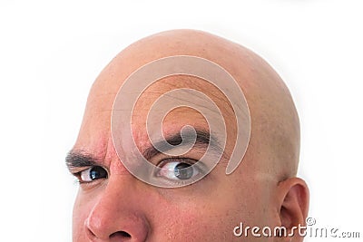 Half face of bald man in white background. Stock Photo